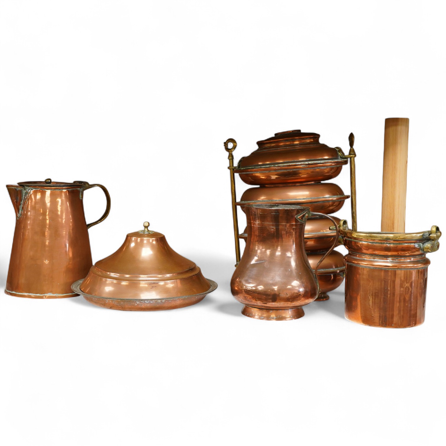Copper vessels and a brass handled jug and bucket, largest 33cm high
